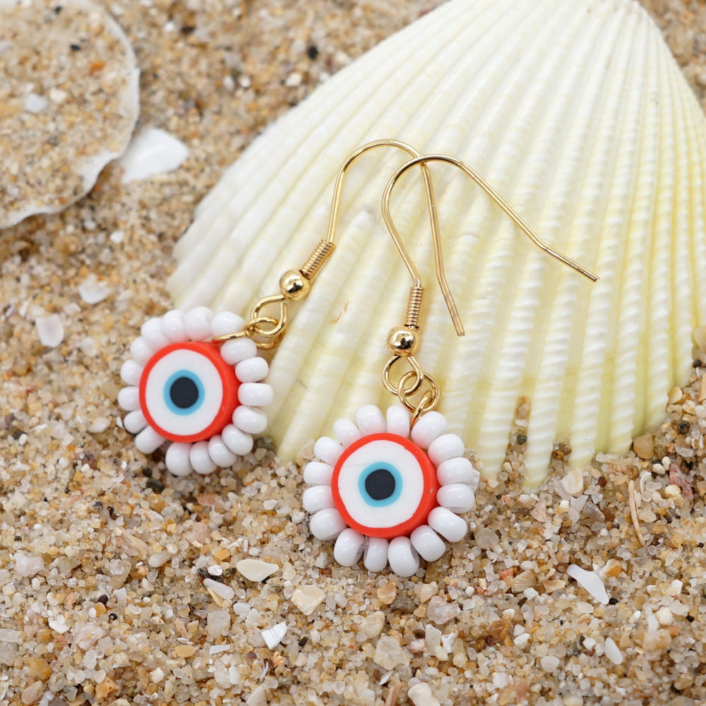 Joyas al por mayor Pendientes de perlas ahumadas con ojos de girasol